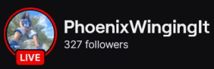 PhoenixWingingIt's Twitch logo and follower count (327). Logo is a full body picture of a black man, angled to look up at him, wearing a blue shirt and blue jean shorts, Image links to PhoenixWingingIt's Twitch page.