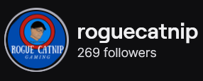 RogueCatnip's Twitch logo and follower count (269). Logo is a picture of a light skinned black man wearing a black baseball cap with a red circle, set to a blue background, with "Rogue Catnip Gaming' in white letters. Image links to RogueCatnip's Twitch page.